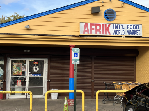 Afrik Int'l Food World Market storefront sign and entrance
